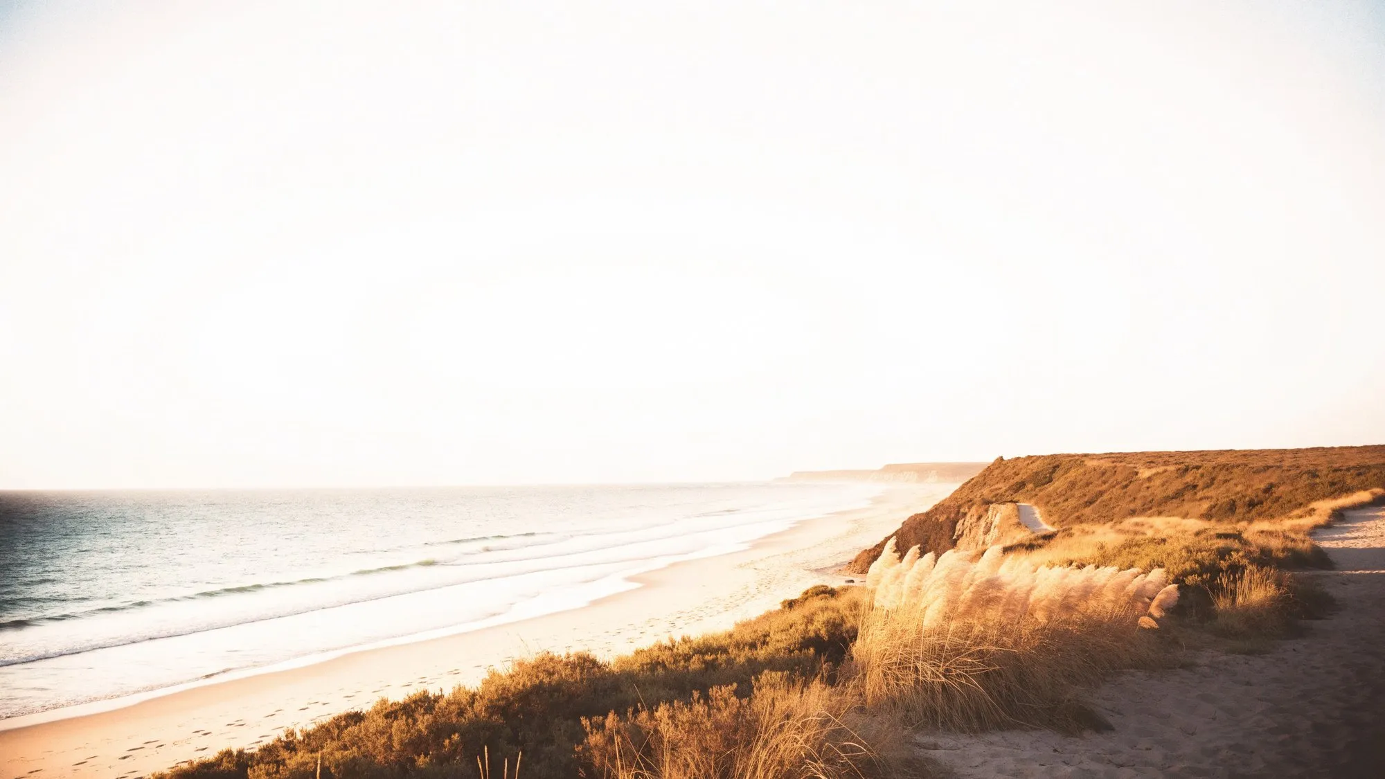 The Atlantic coastline at Carcavelos, Portugal, at dusk